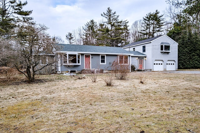 view of front of property with a garage