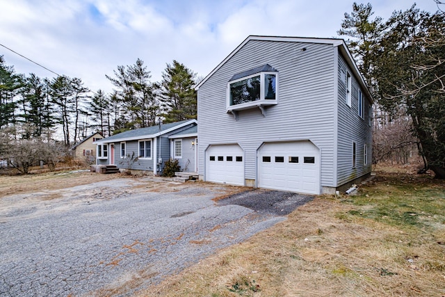 view of front of house with a garage