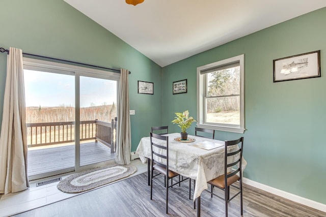 433 Works Rd, Jackson, ME 04921 - dining room featuring hardwood / wood-style floors and vaulted ceiling