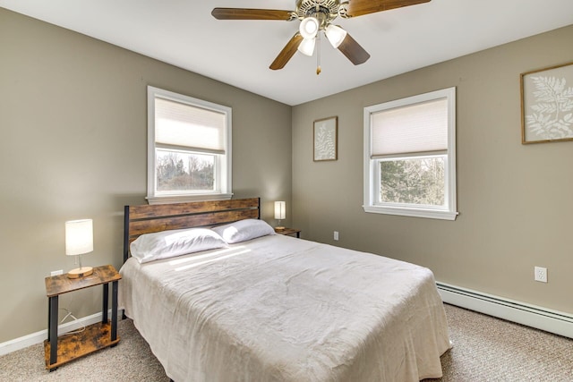 433 Works Rd, Jackson, ME 04921 - carpeted bedroom featuring ceiling fan and a baseboard heating unit