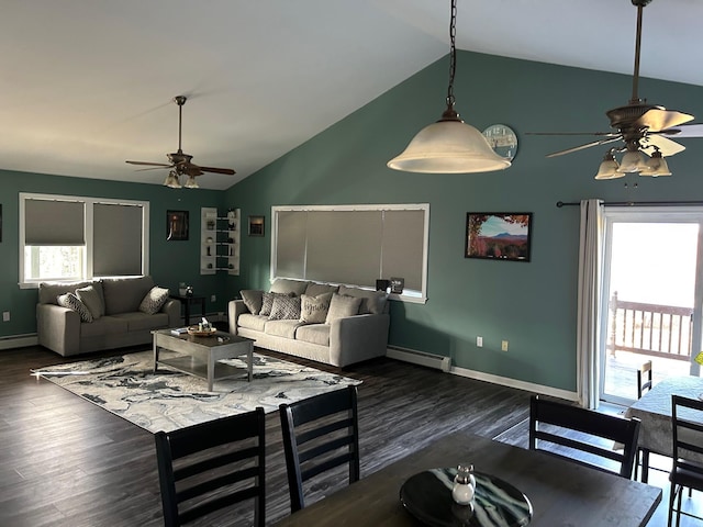 433 Works Rd, Jackson, ME 04921 - living room featuring plenty of natural light, vaulted ceiling, dark hardwood / wood-style floors, and a baseboard heating unit