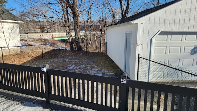 exterior space with an outbuilding and fence