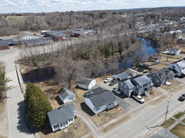 aerial view featuring a residential view and a water view