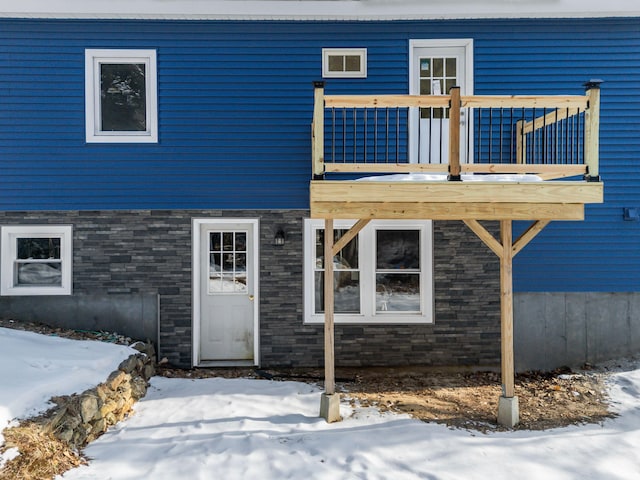 view of front of house with a balcony