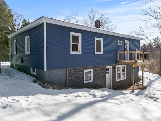 exterior space featuring a wooden deck