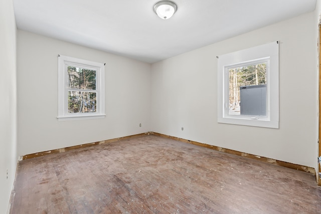 spare room featuring a wealth of natural light