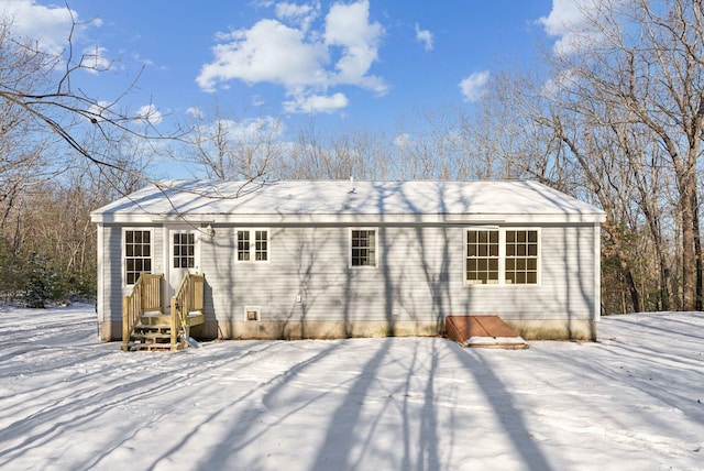 view of snow covered property