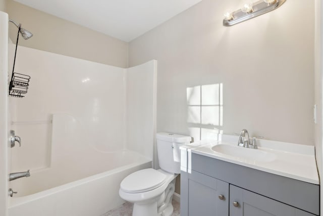 full bathroom with tub / shower combination, vanity, and toilet