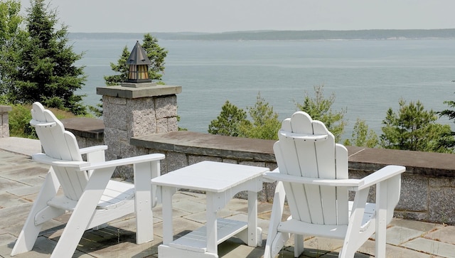 view of patio / terrace featuring a water view