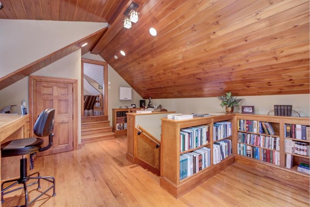 home office with wooden ceiling, lofted ceiling, and light wood-type flooring