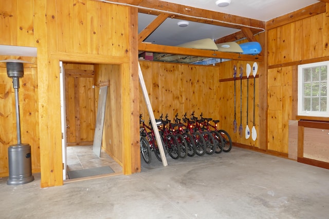 garage featuring wooden walls