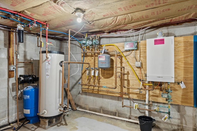 utility room featuring gas water heater and water heater