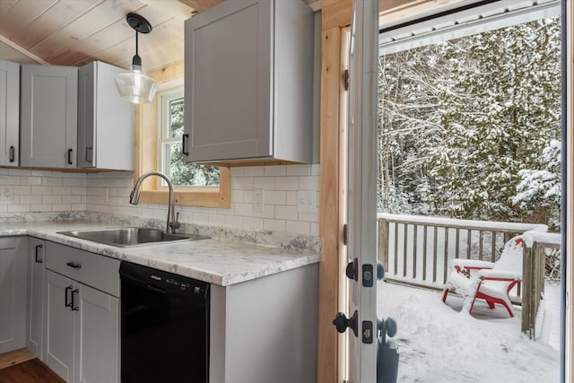 kitchen with gray cabinets, dishwasher, pendant lighting, and sink