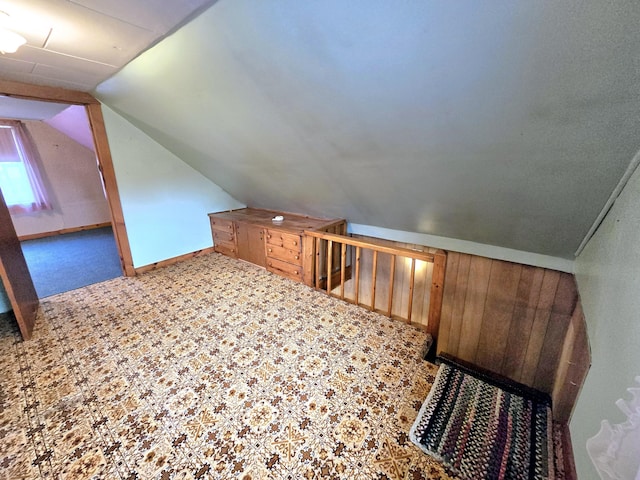 bonus room with vaulted ceiling