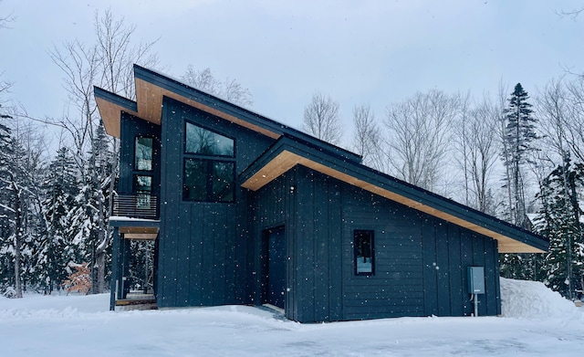 view of snow covered property