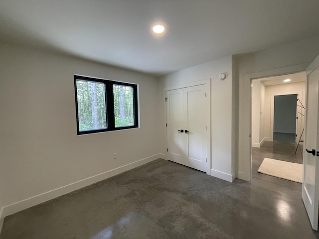 unfurnished bedroom featuring a closet