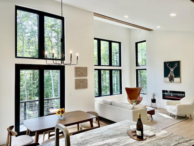 living room featuring hardwood / wood-style flooring and a chandelier