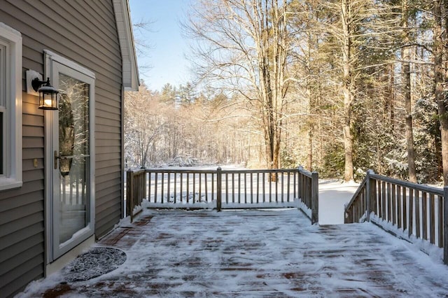 view of snow covered deck