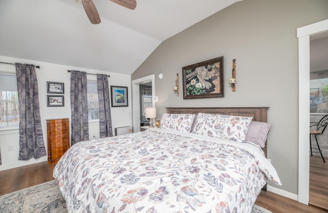 bedroom featuring vaulted ceiling, ceiling fan, and wood-type flooring