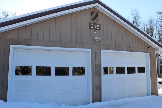 view of snow covered garage