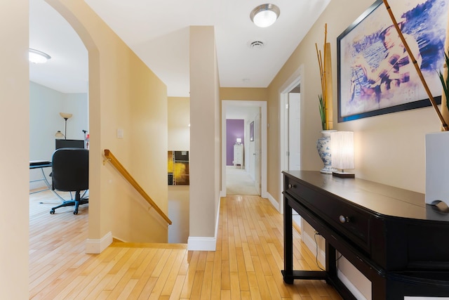 hallway featuring light hardwood / wood-style floors