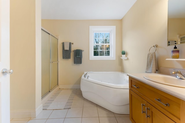 bathroom with separate shower and tub, tile patterned floors, and vanity