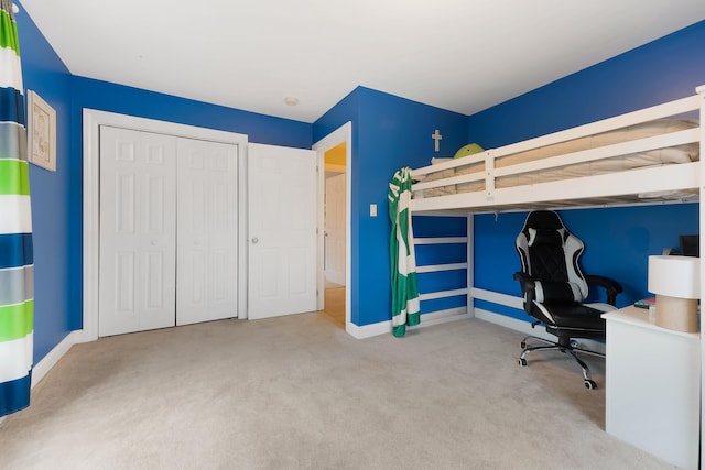 unfurnished bedroom featuring a closet and carpet