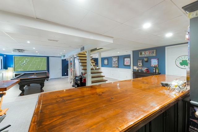 interior space with pool table and a drop ceiling