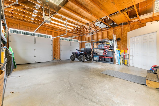 garage featuring a garage door opener