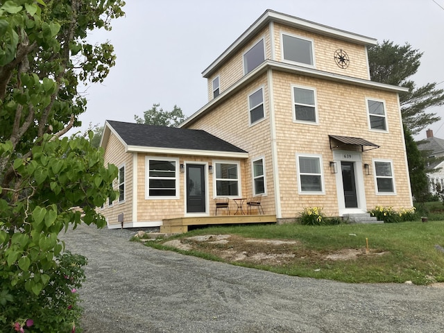 view of front of home with a wooden deck