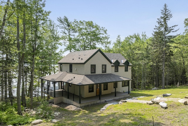 31 Viking Way, Bristol, ME 04539 - back of house featuring a lawn, roof with shingles, and a porch