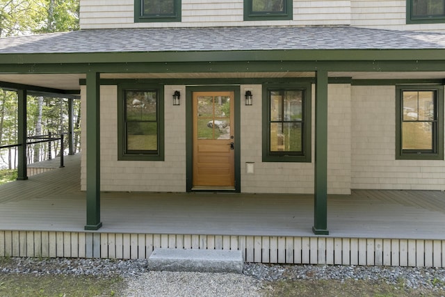 31 Viking Way, Bristol, ME 04539 - view of exterior entry featuring roof with shingles and a porch