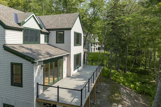 31 Viking Way, Bristol, ME 04539 - view of front facade featuring a shingled roof and a wooden deck