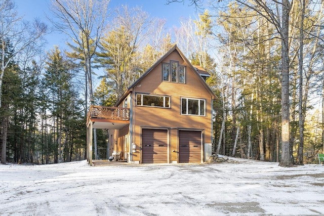 view of snow covered garage