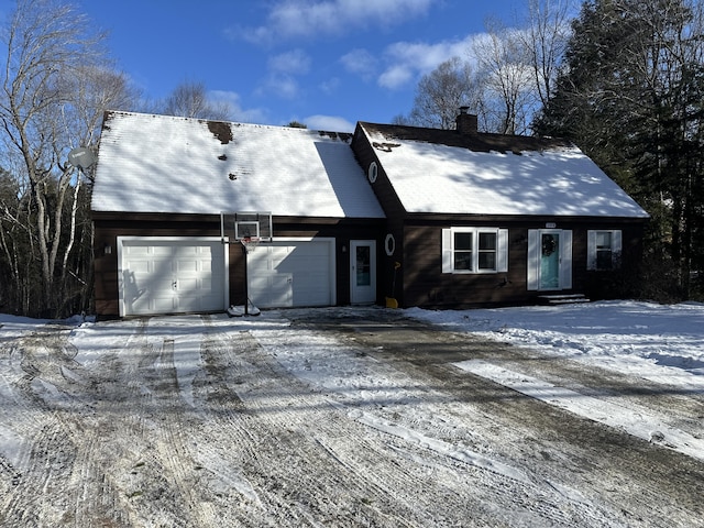 single story home featuring a garage