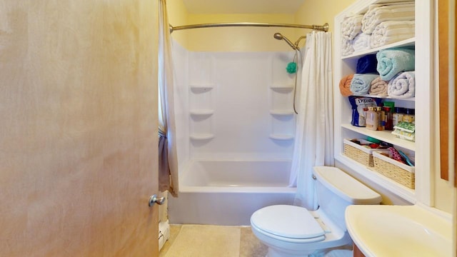 bathroom featuring toilet and shower / bath combination with curtain