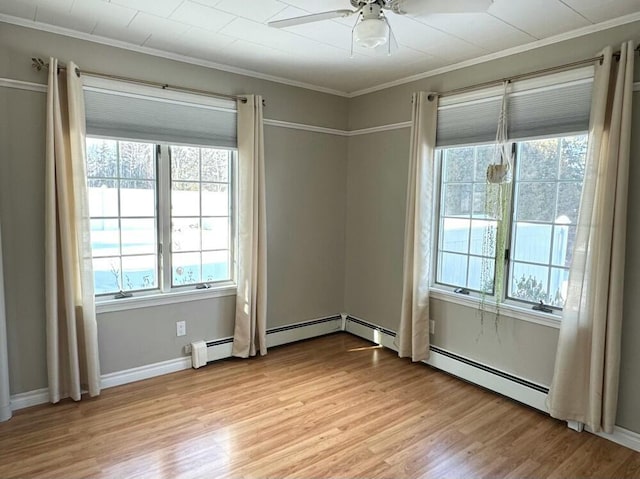 unfurnished room featuring ceiling fan, light hardwood / wood-style flooring, and crown molding