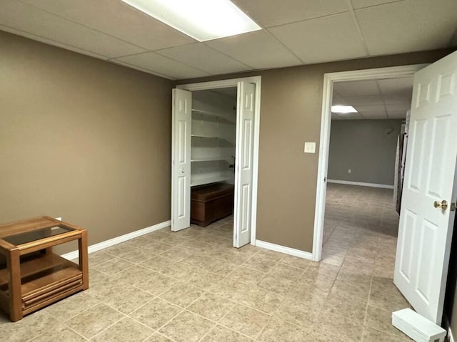 interior space featuring a paneled ceiling