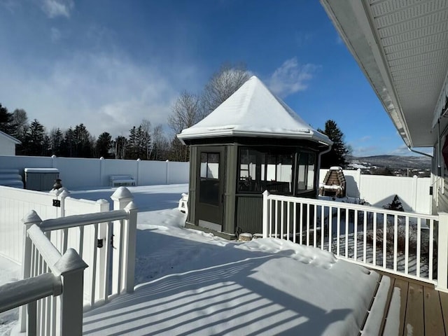 view of snow covered deck