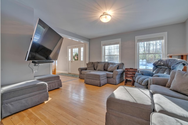 living room with light hardwood / wood-style floors