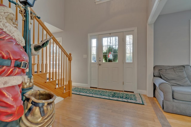 entryway with light hardwood / wood-style flooring