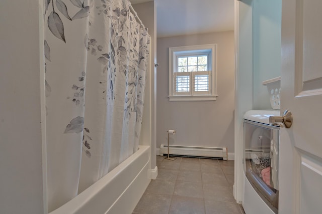 bathroom with shower / bathtub combination with curtain, baseboard heating, and tile patterned floors