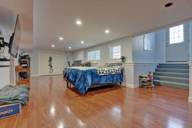 bedroom with hardwood / wood-style floors