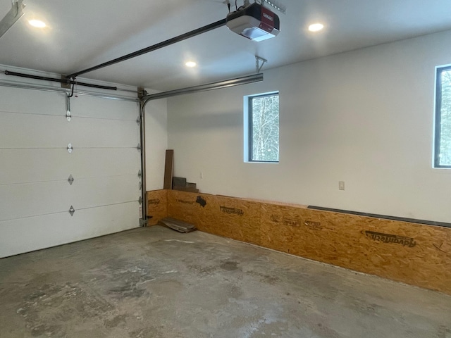 garage featuring a garage door opener