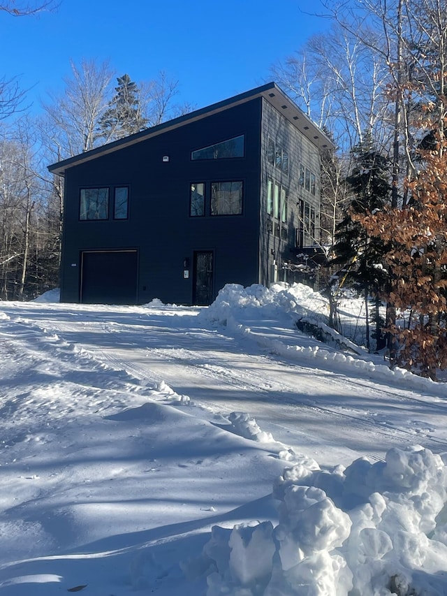 exterior space with a garage