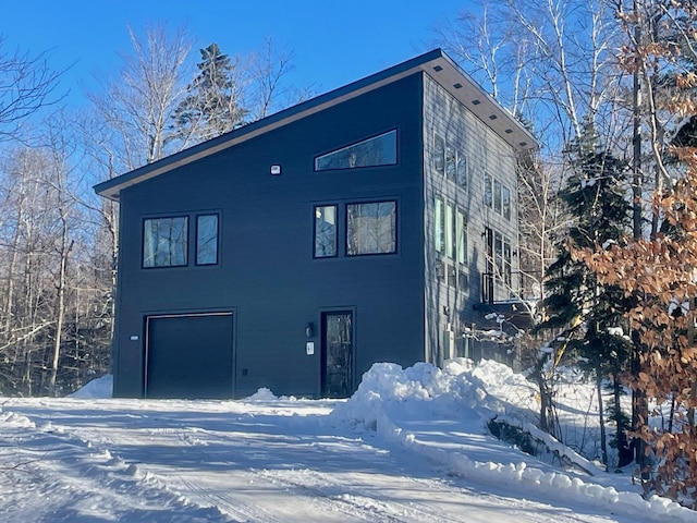 exterior space with a garage