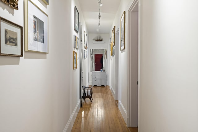 corridor featuring light wood-type flooring