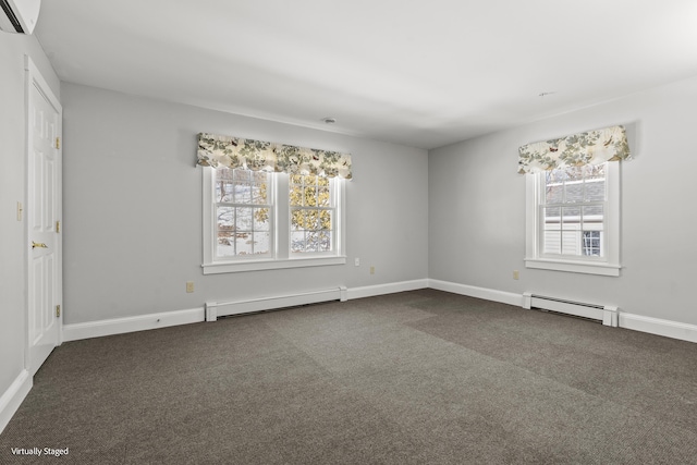 unfurnished room featuring a baseboard radiator, a wall unit AC, and dark colored carpet