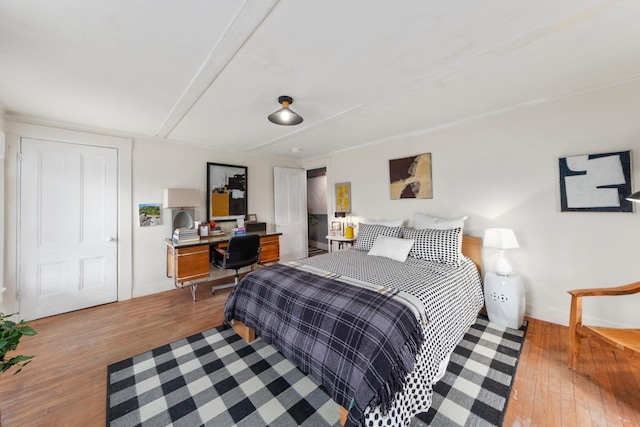 bedroom featuring light wood-type flooring