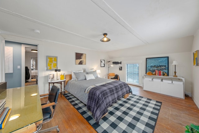 bedroom featuring light wood-type flooring